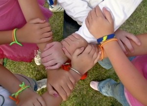 kids hands linked